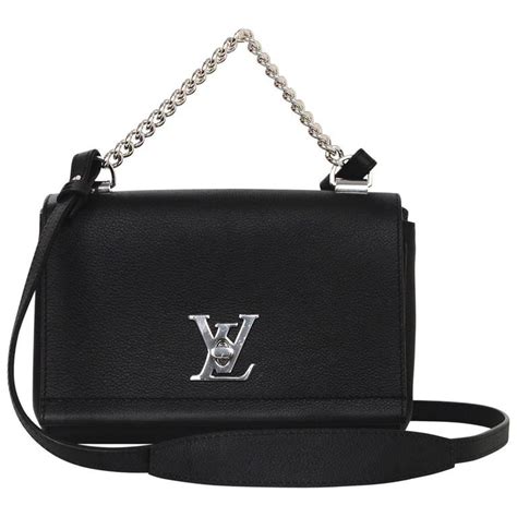 louis vuitton black crossbody purse.